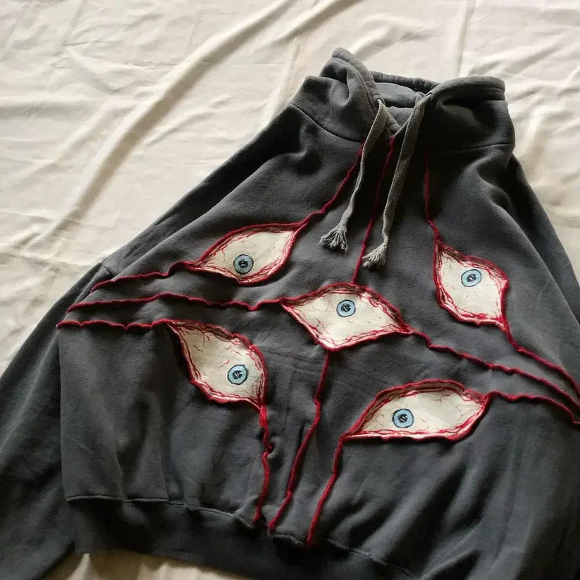 Sudadera con capucha bordada con ojos de Harajuku